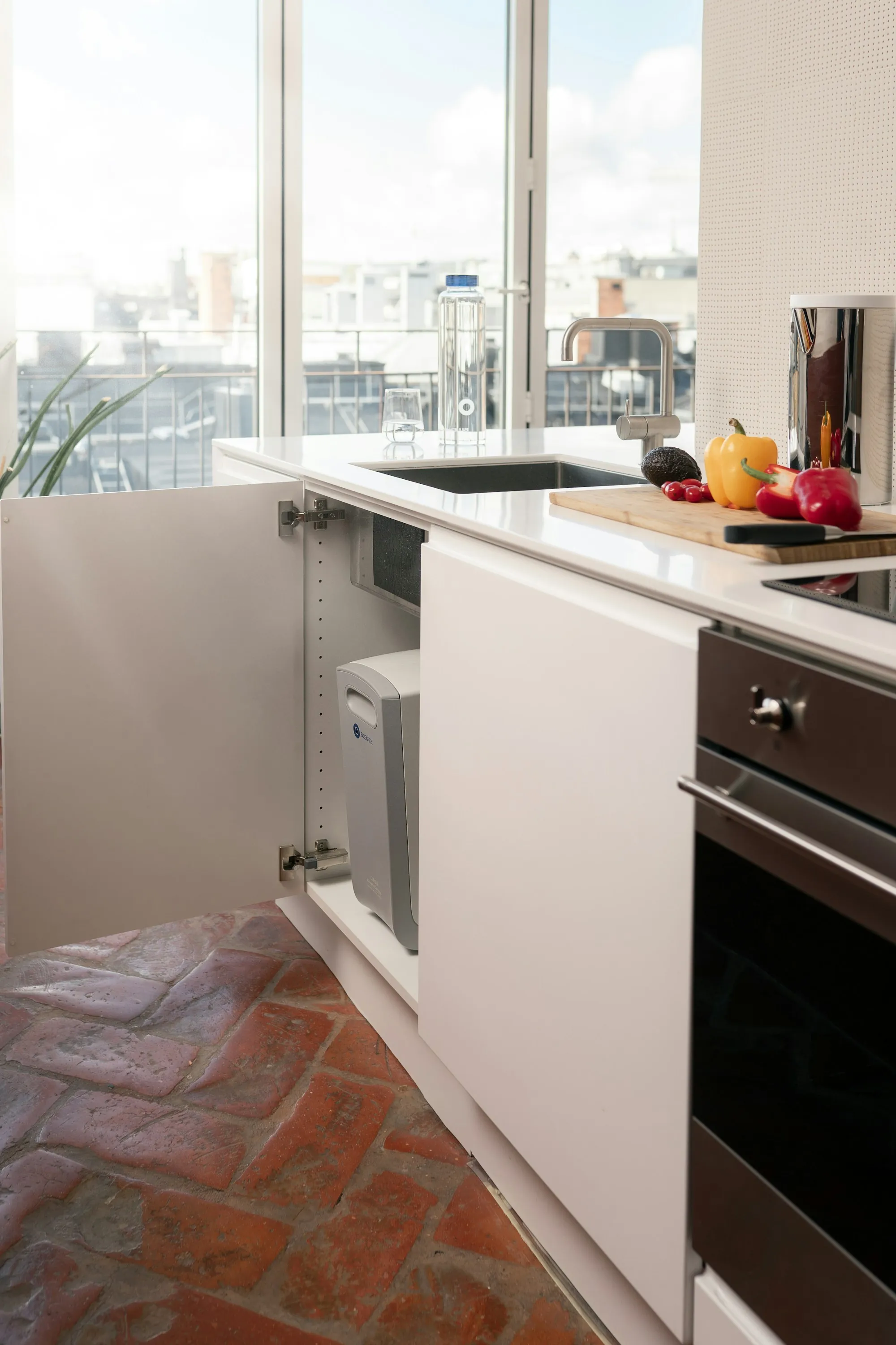 Bright kitchen with a large window and sink