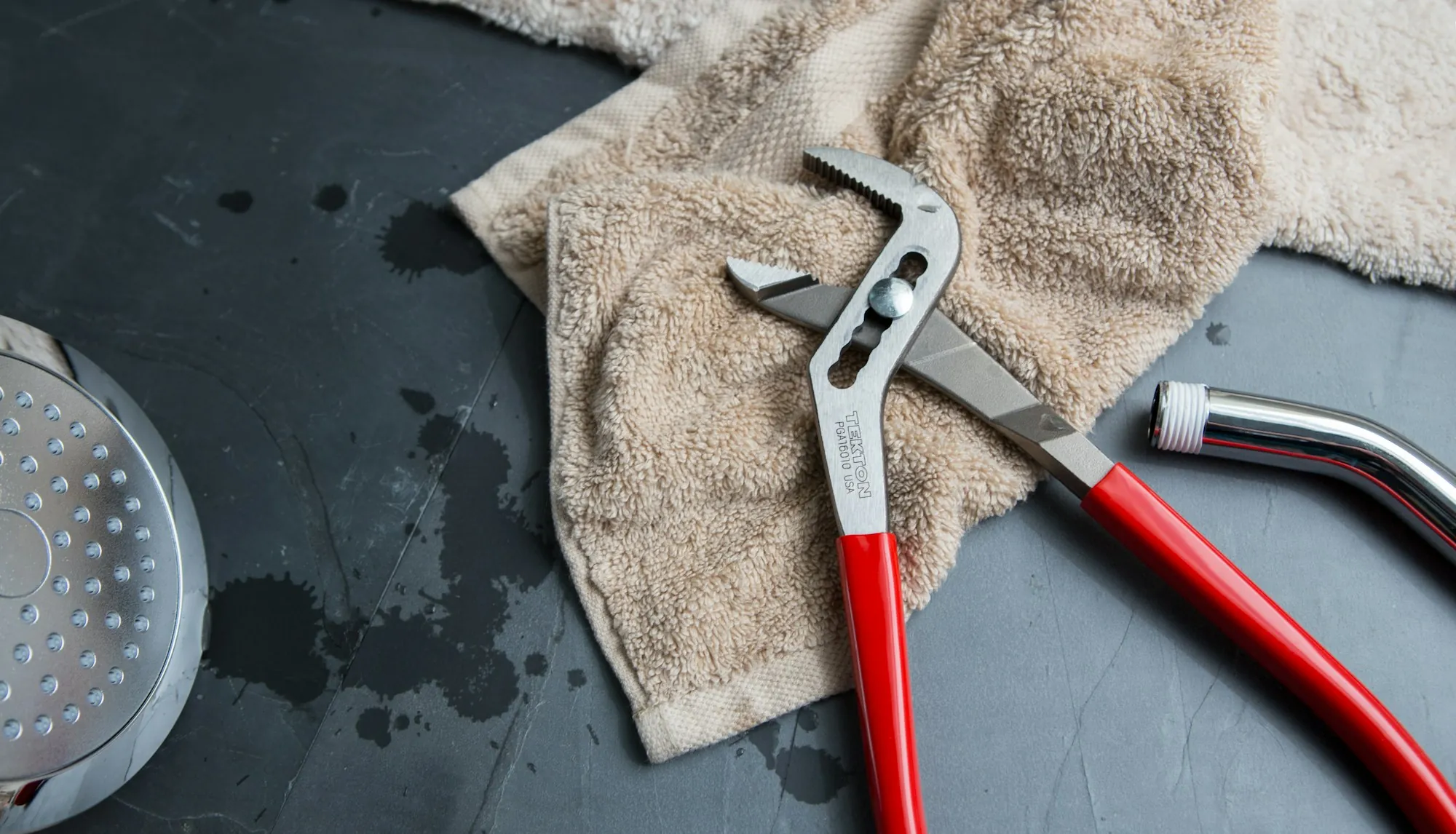 Pipe wrench resting on a towel