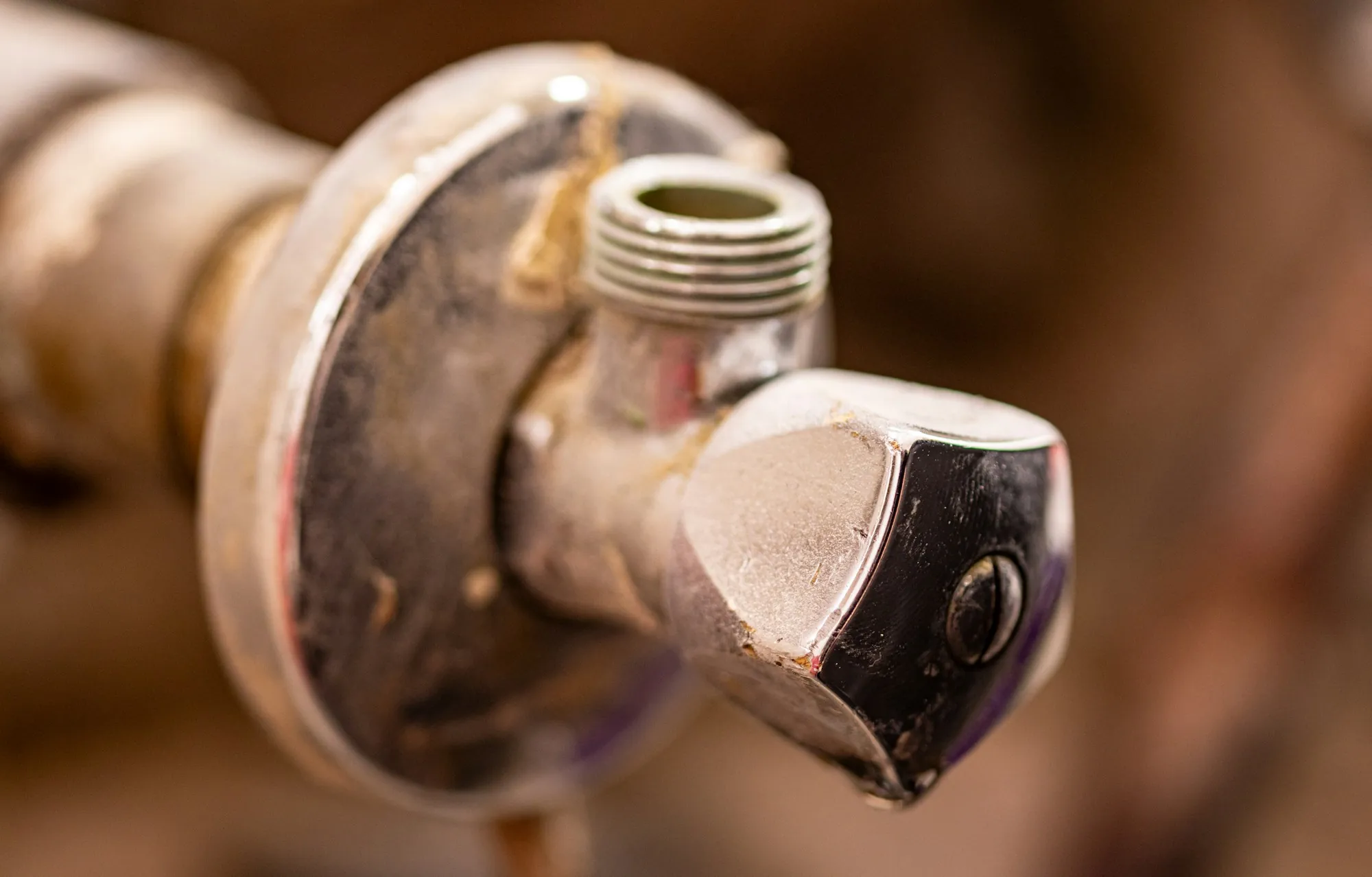 Close-up of a corroded pipe fitting